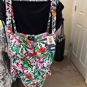 Tankini. NWT. Multi colored top. Black bottom.